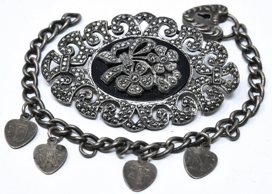 Antique Silver Marcasite Brooch + Padlock Bracelet: Antique Silver Marcasite Brooch + Padlock Bracelet. Heart shaped padlock. Brooch measures 2 inches in length.