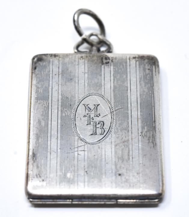 Sterling Art Deco Style Locket Necklace Pendant: Sterling Art Deco Style Locket Necklace Pendant. Marked Marathon Sterling. Measures 1.75 inches in length.