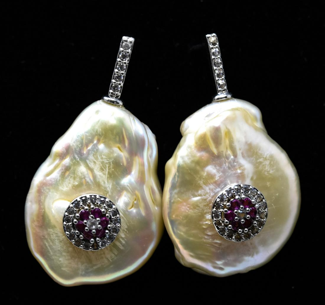 Pair of Baroque Pearl & Pave Jeweled Earrings: Pair of Baroque Pearl & Pave Jeweled Earrings. Each measures 1.25 inches in length.
