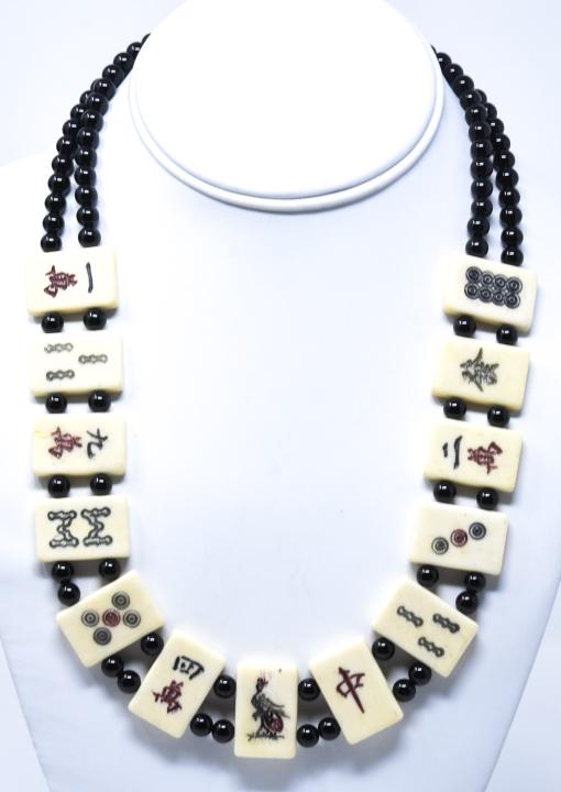 Antique Mahjong Tile & Onyx Bead Necklace: Antique Mahjong Tile & Onyx Bead Necklace. Featuring two rows of onyx beads and 13 antique bone mahjong tiles. Measures approximately 22 inches.