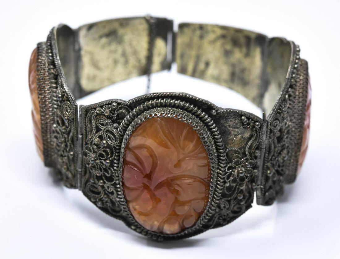 Asian Filigree & Hand Carved Carnelian Bracelet: Asian Filigree & Hand Carved Carnelian Bracelet. Panel bracelet with filigree and hand carved carnelian panels. 7 inches in length.