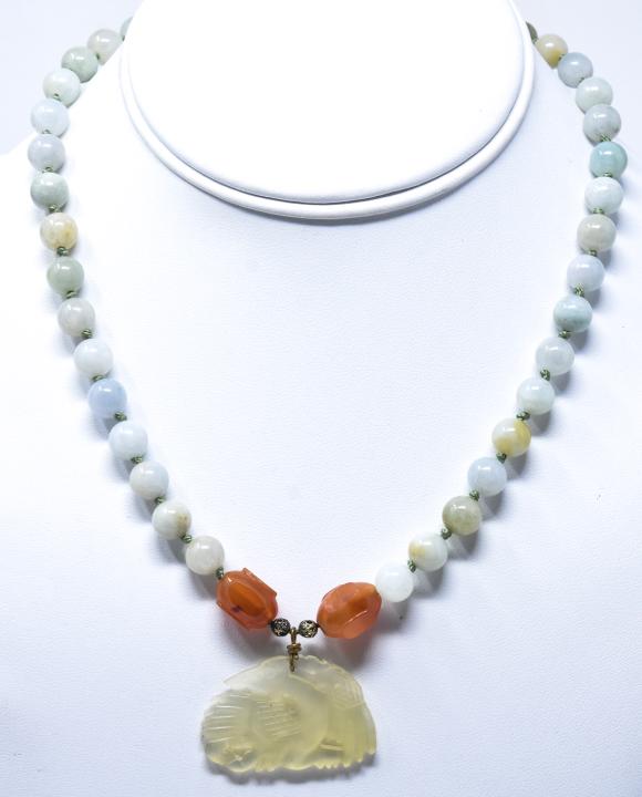 Antique Green Jade & Carnelian Necklace: Antique Green Jade & Carnelian Necklace. Green jade beads with carnelian and bowenite carved bird pendant. Measures 16 inches plus pendant.