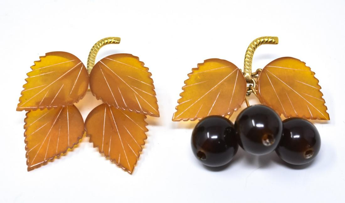 Two Vintage Carved Figural Amber Brooch Pins (1 of 6)