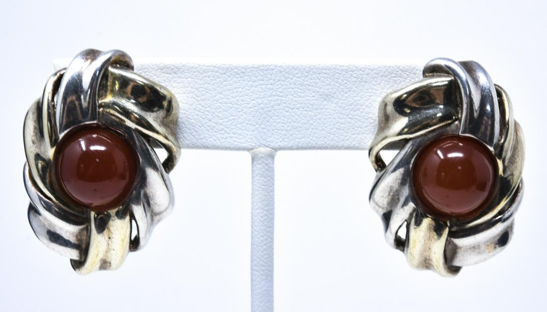 Vintage Sterling & Vermeil Earrings w Carnelian: Vintage Sterling & Vermeil Earrings w Carnelian Cabochons. Clip ons. Each measures 1.25 inches in length. Total weight approximately 18 grams inclusive.