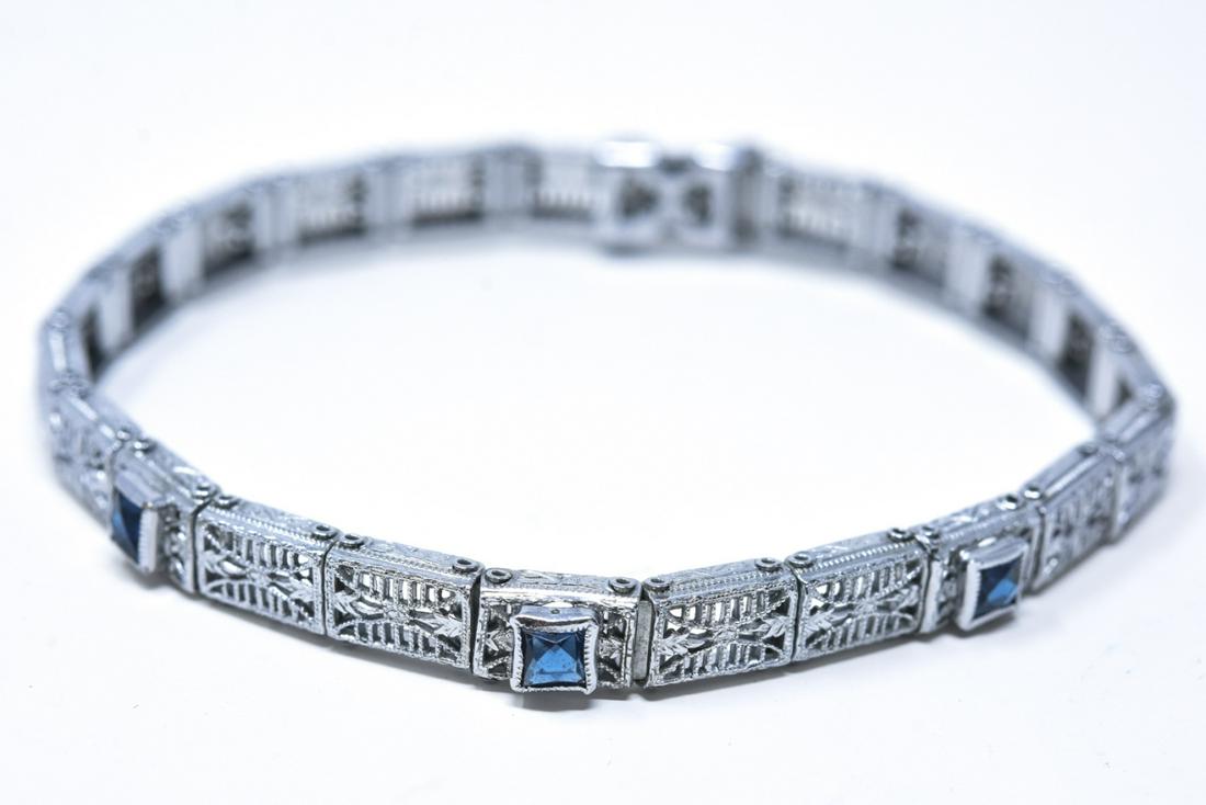 Edwardian Style Filigree Sapphire Paste Bracelet: Edwardian Style Filigree Sapphire Paste Bracelet. Measures 7 inches in length. Not hallmarked, possibly sterling silver.