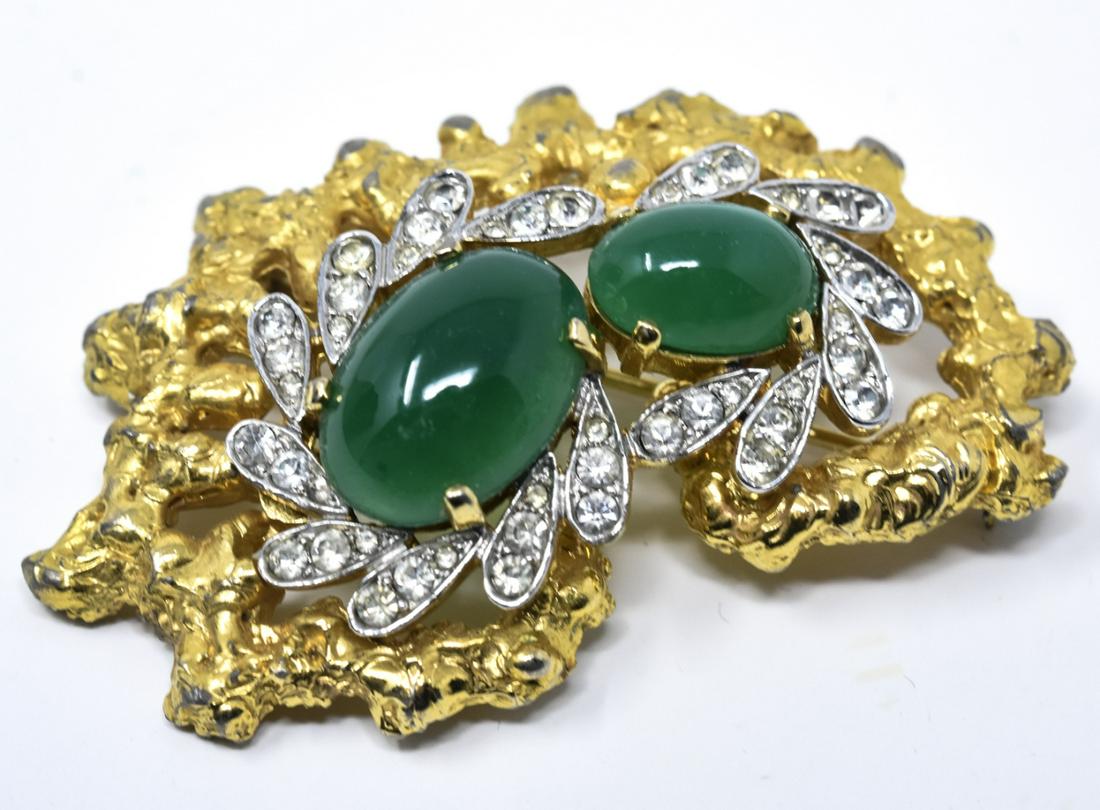 Vintage C 1970s Jomaz Emerald Paste Brooch: Vintage C 1970s Jomaz Emerald Paste Costume Jewelry Brooch. Signed back. Emerald glass cabochons, diamond paste and gilt metal. Measures 2.5 inches in length.