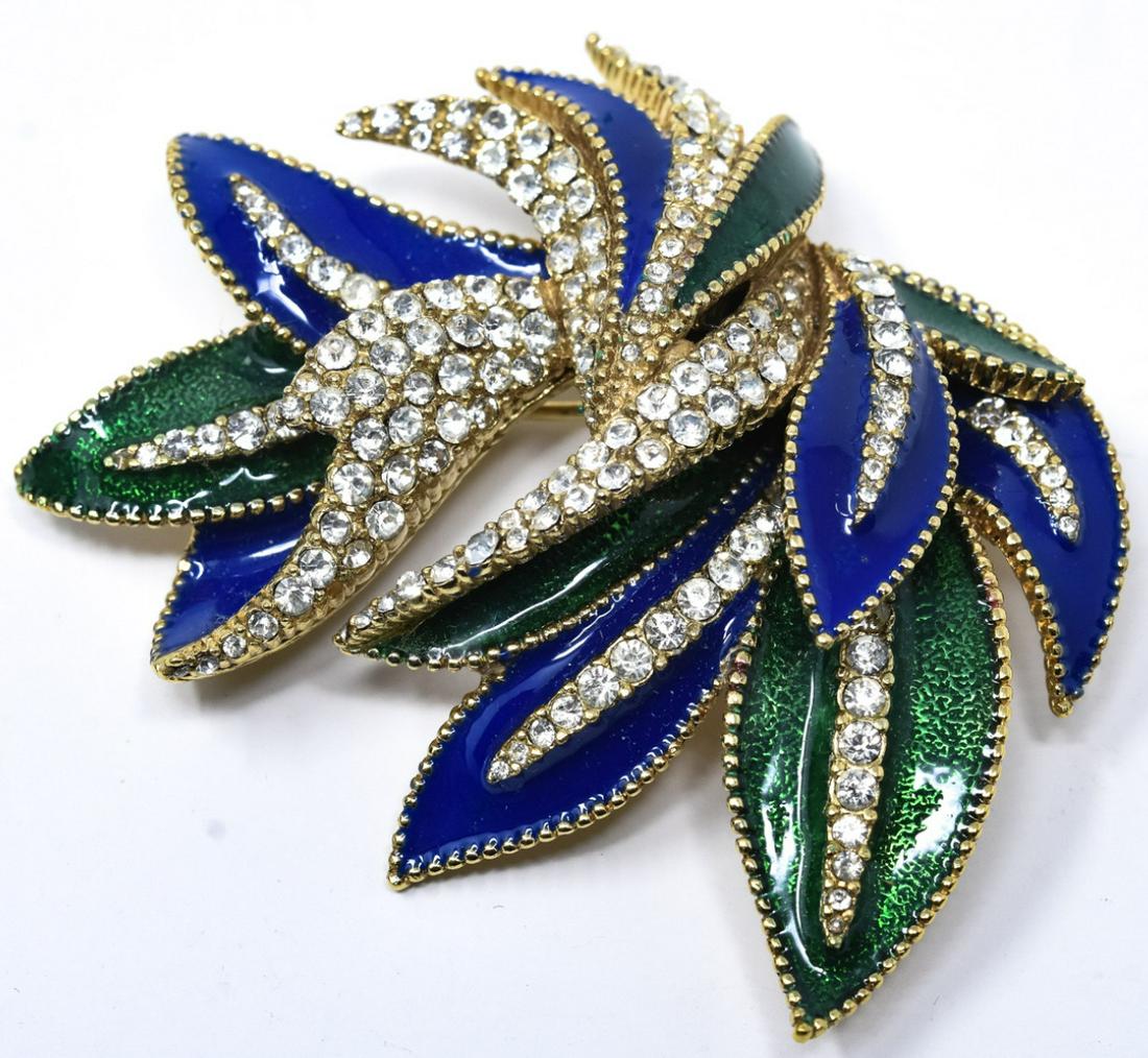 Vintage Ciner Gilt Enamel & Rhinestone Brooch: Vintage Ciner Gilt Enamel & Rhinestone Brooch. Signed back. Blue and green enamel with diamond paste. Measures 2.5 inches in width.