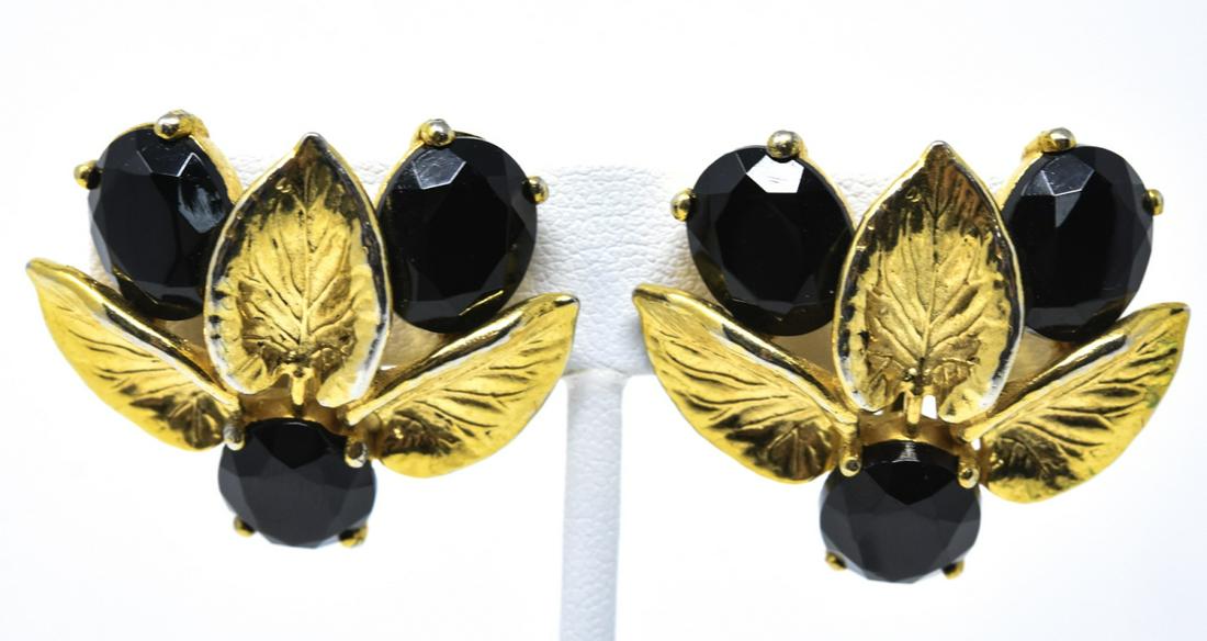 Vintage C 1950s Elsa Schiaparelli Clip on Earrings: Vintage C 1950s Elsa Schiaparelli Clip on Earrings. Signed on backs. Gilt metal, textured leaves and oval cut rhinestones. Each measures approximately 1.25 inches in width.