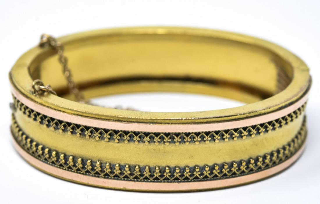 Antique 19th C Gold Filled & Gold Topped Bracelet: Antique 19th C Victorian Gold Filled & Gold Topped Hinged Bangle Bracelet w Safety Chain. Weighs 29.7 grams total. Measures 2 inches across the interior opening.