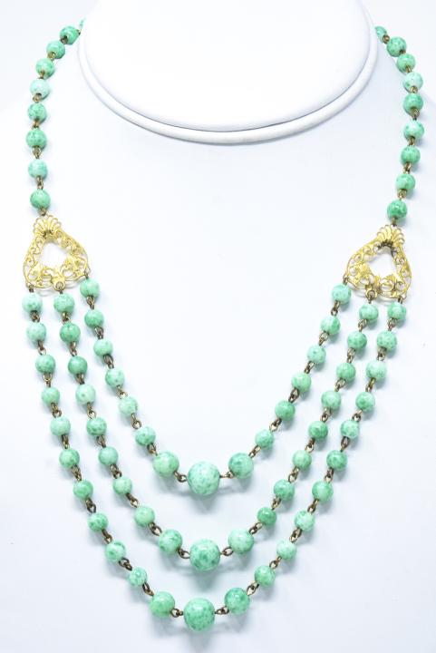 Antique Art Deco Czech Art Glass Necklace: Antique Art Deco Czech Art Glass Necklace. Gilt metal and faux green jade. Three tier swag. Measures nearly 20 inches in length.