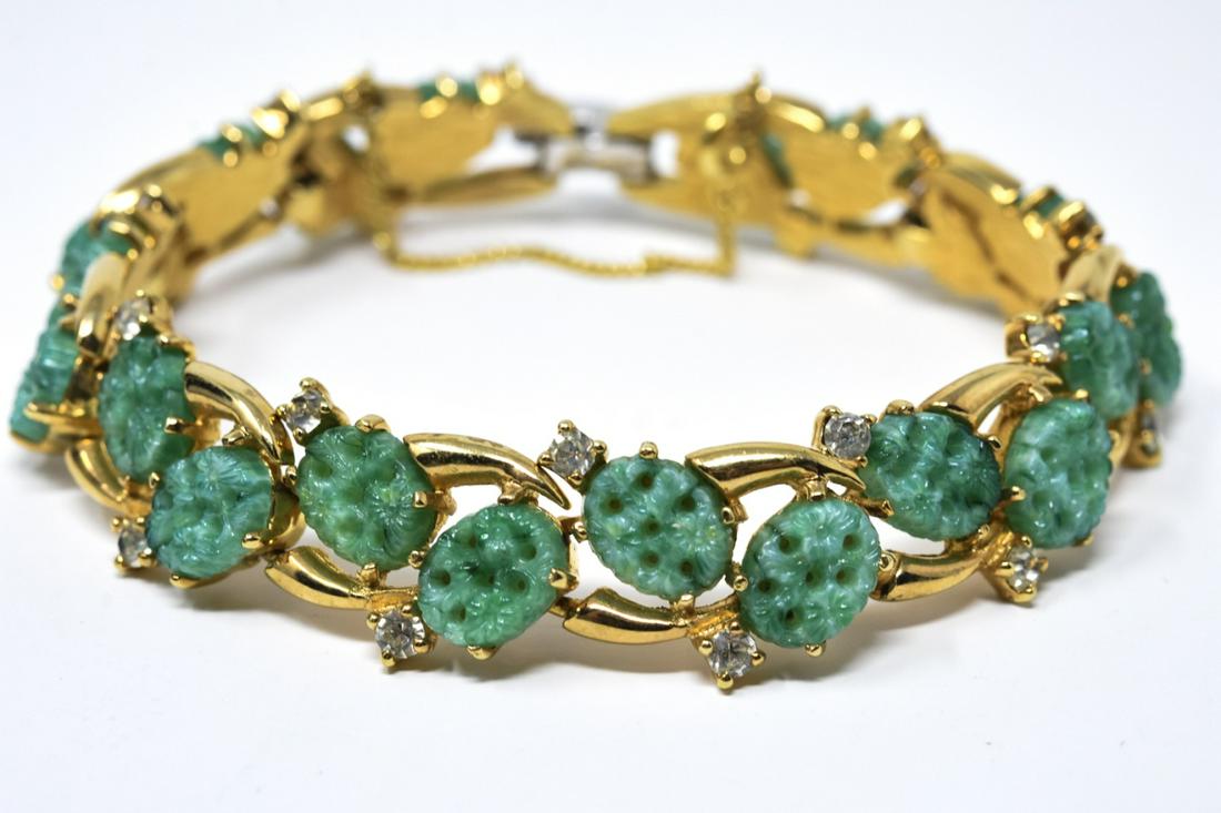 Vintage Jomaz Gilt Metal & Jade Glass Bracelet: Vintage Jomaz Gilt Metal & Jade Glass Bracelet w Safety Chain. Unsigned, attributed to Jomaz. Set with pate de vere jade glass plaques and accent rhinestones. Measures 7.75 inches in length.