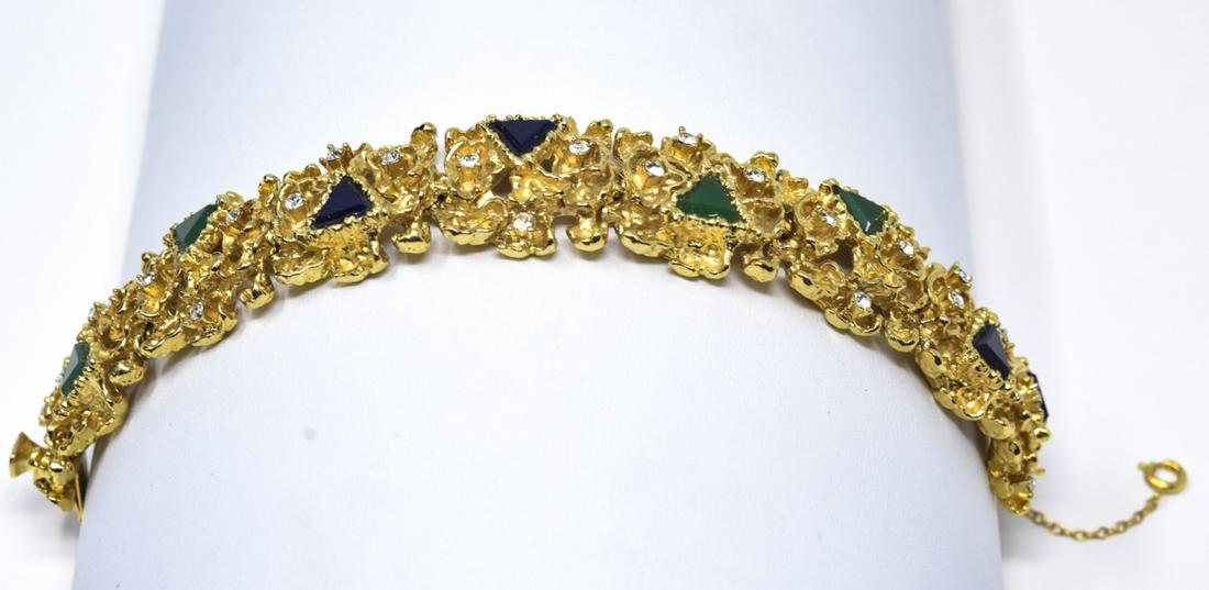 Vintage C 1970s D'Orlan Gilt & Rhinestone Bracelet: Vintage C 1970s D'Orlan Gilt & Rhinestone Bracelet w Safety Chain. Signed. Having a brutalist / modernist style. Set with glass and paste. Measures 7 inches in length.