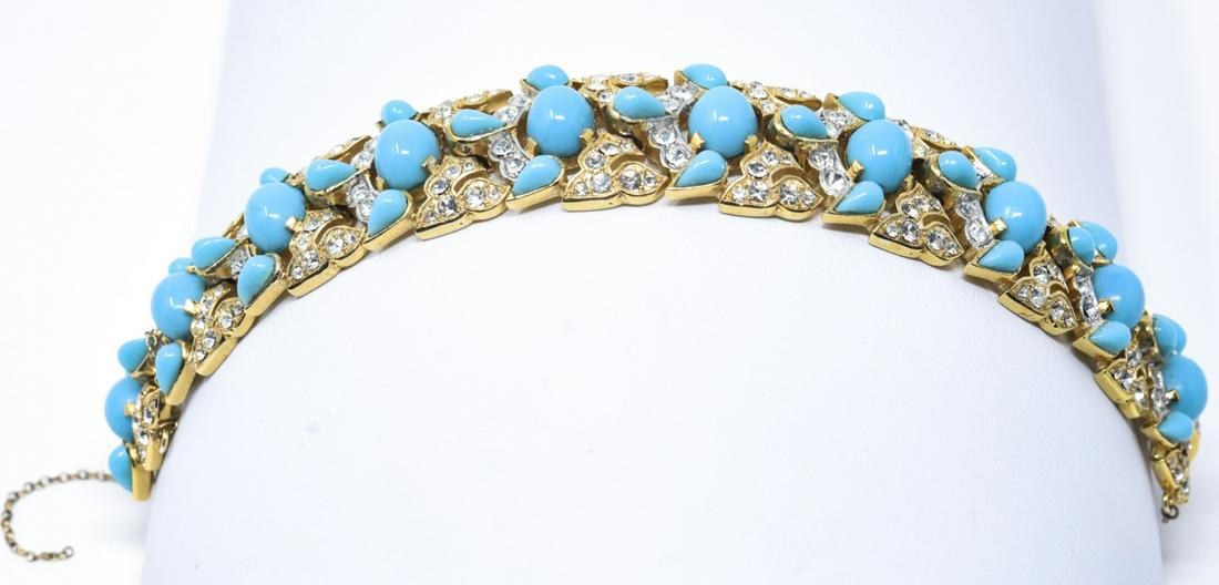 Vintage C 1970 Crown Trifari Mughal Style Bracelet: Vintage C 1970s Crown Trifari Mughal Style Bracelet. Gilt metal, clear rhinestones and faux Persian turquoise. Signed. Measures 7 inches in length.