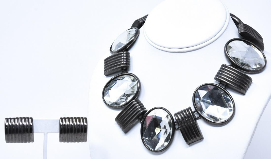Ben Amun Costume Jewelry Necklace & Earrings: Ben Amun Costume Jewelry Necklace & Earrings Set. Signed. Earrings are clip on. Necklace measures 16.25 inches in length. Earrings with ribbed design, necklace with rose cut rhinestones.