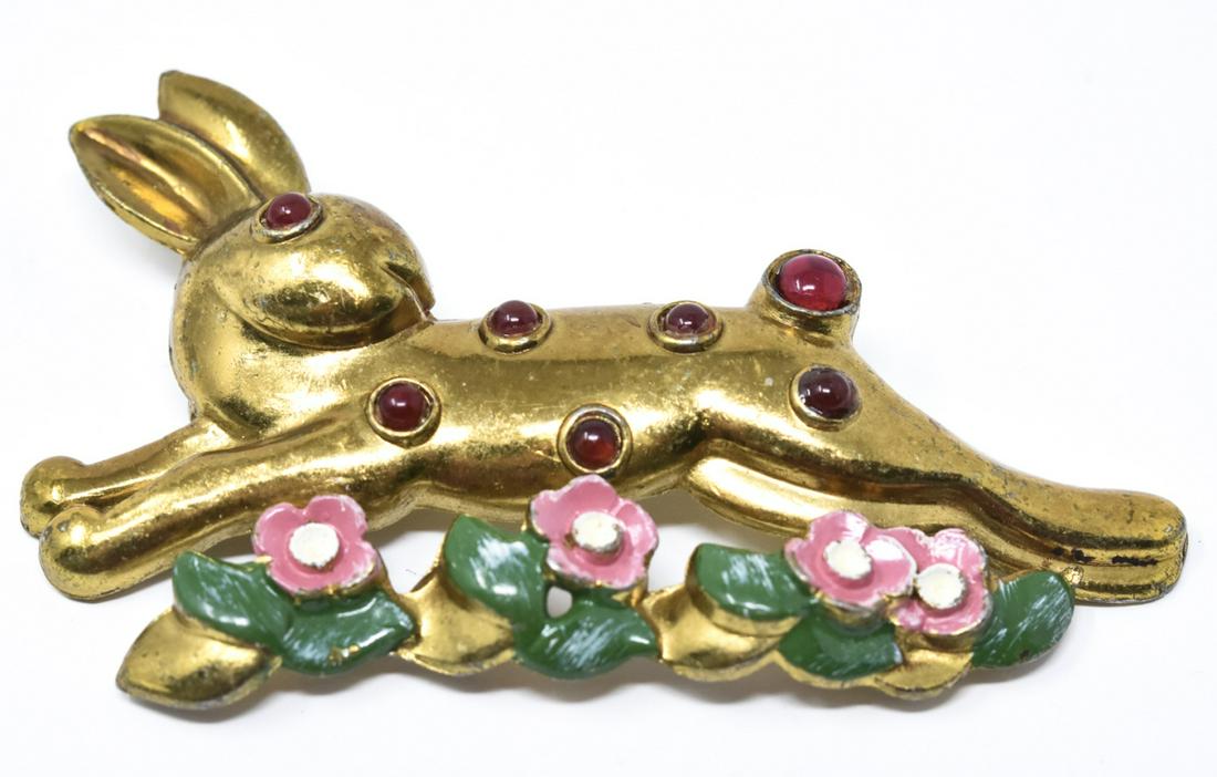Vintage C 1930s Gilt Enamel & Cabochon Brooch: Vintage C 1930s Gilt Enamel & Cabochon Brooch. Rabbit leaping over flowers. Having ruby paste cabochons. Measures just over 3 inches in length.