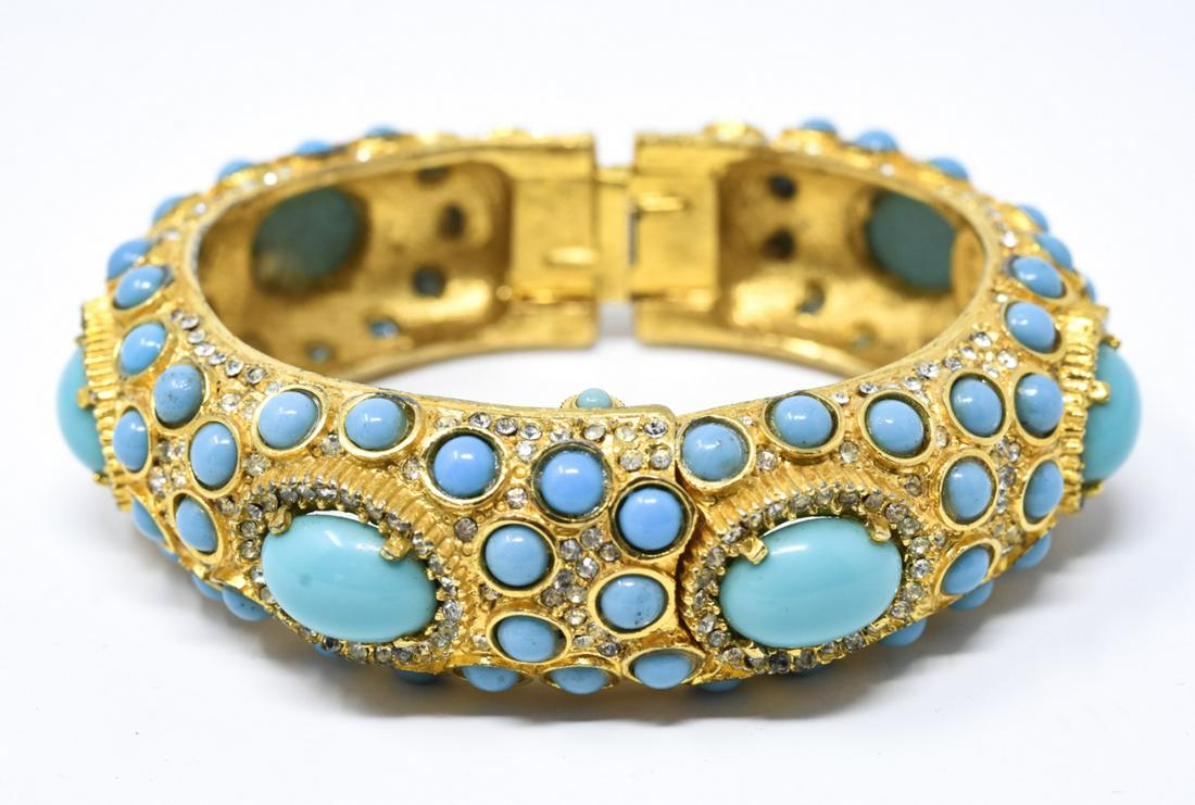 Vintage C 1975 Kenneth J Lane Bracelet w Watch: Vintage C 1975 Kenneth J Lane Bracelet w Watch. Clamper / hinged bangle bracelet with a watch made by Sheffield, 17 jewel. Gilt metal and set with faux Persian turquoise cabochons. Measures just over 