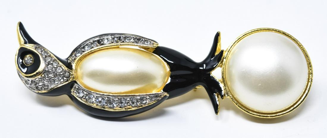 Vintage Costume Kenneth J Lane Penguin Brooch: Vintage Costume Kenneth J Lane Penguin Brooch – A great example of signed Kenneth J lane design with faux pearl and faux diamond decoration. Approximately 2.5” x .75” Unsold stock used for displ