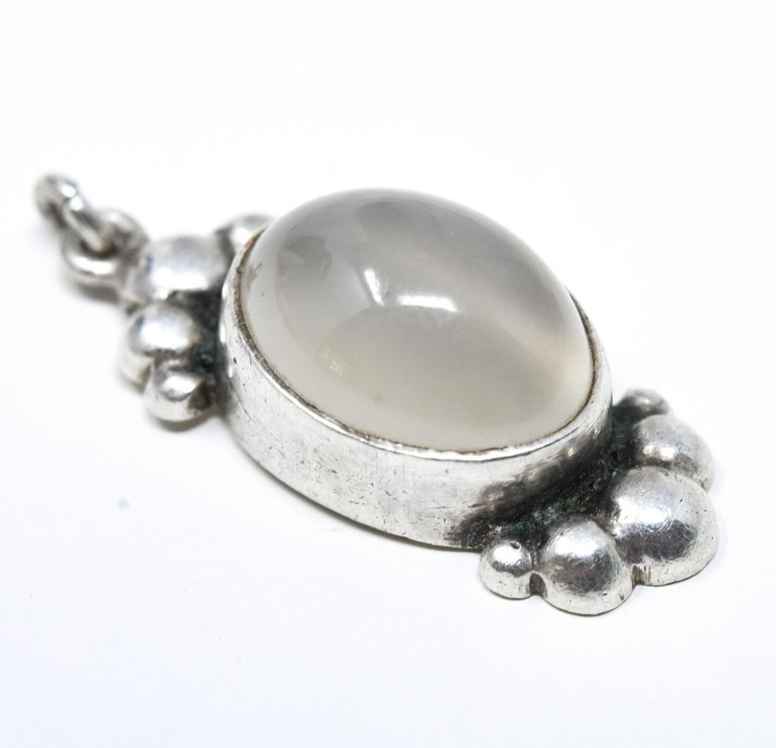 Sterling & Moonstone Cabochon Necklace Pendant: Sterling Silver & Moonstone Cabochon Necklace Pendant. Measures just over 1 inch in length plus bail.