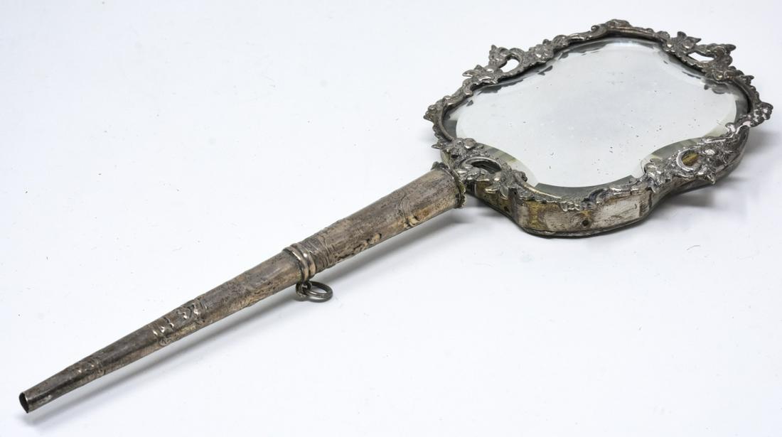 Antique European Silver Beveled Glass Hand Mirror: Antique European Silver Beveled Glass Hand Mirror. Measures 11.5 inches in length. Something is broken off the end.