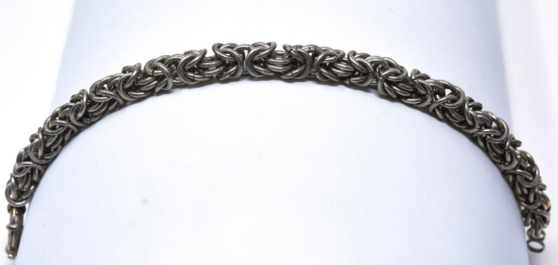 Sterling Silver Bracelet W Byzantine Links: Sterling Silver Bracelet W Byzantine Links. Measures 7.75 inches in length. Weighs approximately 36 grams.