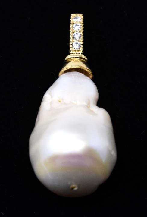 Large Cultured Baroque Pearl Necklace Pendant: Large Cultured Baroque Pearl Necklace Pendant. Bail opens like as clasp. Pearl measures 25 mm in length, pendant overall measures just over 1.5 inches in length.