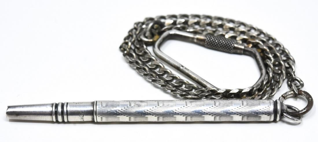 Antique Art Deco Sterling Pencil on Watch Chain: Antique Art Deco Sterling Silver Pencil Pendant on Watch Chain. Pencil is hallmarked and measures 2.75 inches w bail, chain measures nearly 12 inches in length.