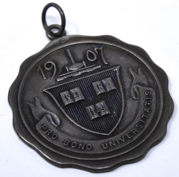 C 1907 Harvard University Speakers Club Medal: C 1907 Harvard University Speakers Club Medal. Dated 1907 medal for the Harvard Speakers Club. Can be worn as a pendant. Measures 2 inches in length with bail.