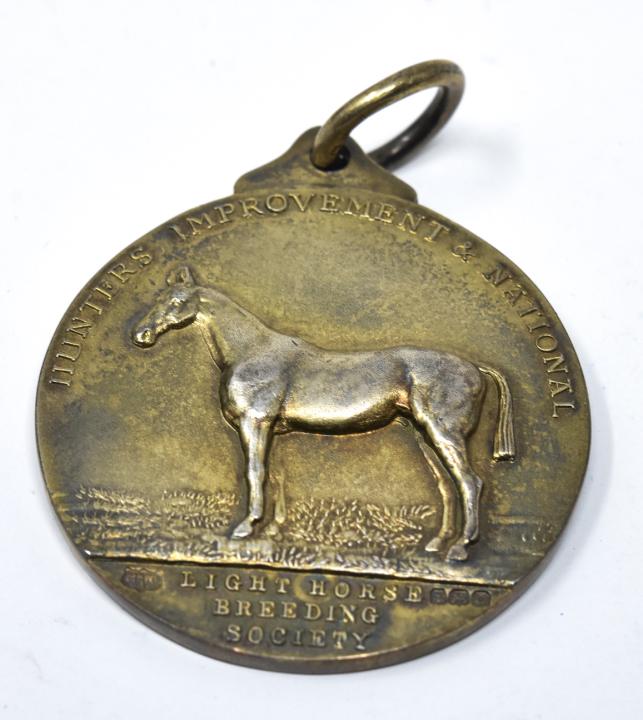 1937 Vermeil Sterling Hunters Improvement Society: 1937 Vermeil Sterling Hunters Improvement Society Medal Pendant. With motif of horse and riders on both sides. Measures nearly 2.5 inches in length with bail.
