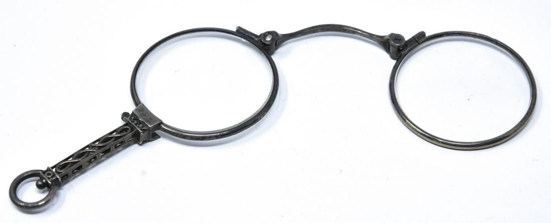 Vintage Sterling Silver Lorgnette Glasses: Vintage Sterling Silver Lorgnette Glasses. Pair measures 4.75 inches in overall width.