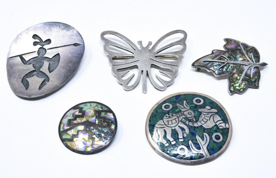 Collection of Vintage Mexican Sterling Silver Pins: Collection of Vintage Mexican Sterling Silver Pins. Some inlaid. Signed / hallmarked.