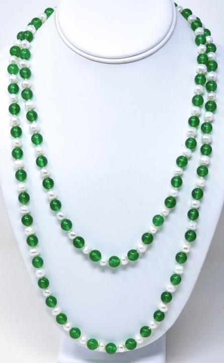 Green Nephrite Jade & Baroque Pearl Necklace: Green Nephrite Jade & Baroque Pearl Necklace. Hand knotted on white silk thread. Measures 50 inches in length. Beads test as Nephrite on the Presidium. Jade beads measures 6 mm in diameter, pearls var