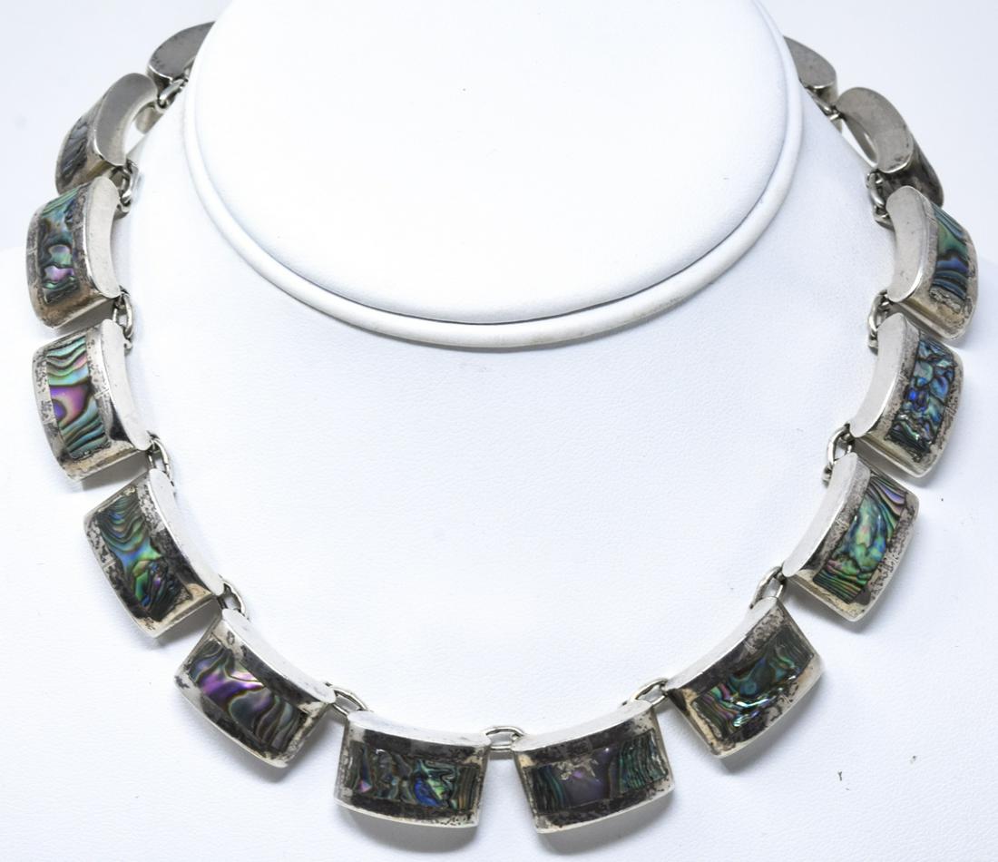 KBN 1970 Mexico Sterling & Abalone Choker Necklace: 1970 Mexico Sterling & Abalone Choker Necklace. Vintage sterling silver and abalone choker necklace, hallmarked Los Costillo Mexico. Circa 1970. Measures 14.5 inches.