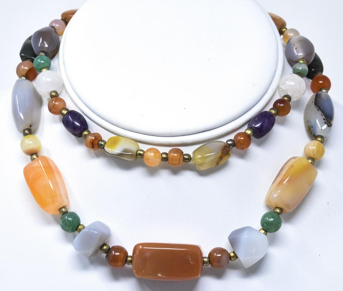 Handmade Necklace w Agate, Carnelian & Amethyst: Handmade Necklace w Rock Crystal, Jasper, Quartz, Agate, Carnelian & Amethyst. Measures 28 inches in length.