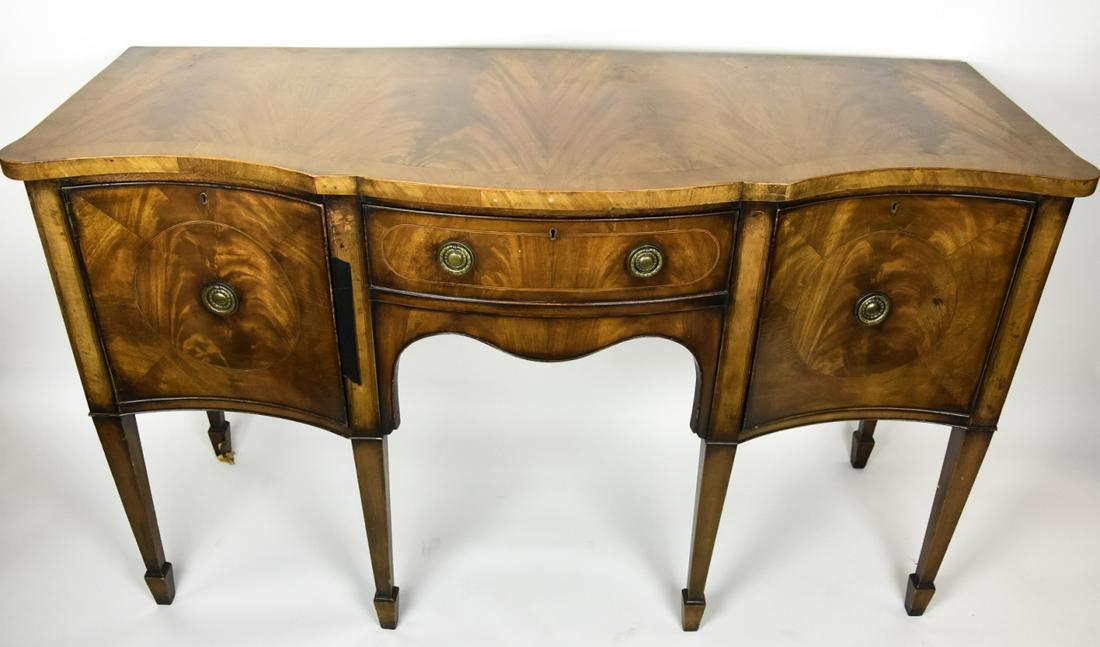 Hepplewhite Burled Veneer Sideboard: Hepplewhite Burled Veneer Sideboard. Hepplewhite style sideboard with two cabinets and center pull-out drawer. Burled veneer, bookmatched and with brass hardware. Measures 36 inches x 59 inches x 23 i
