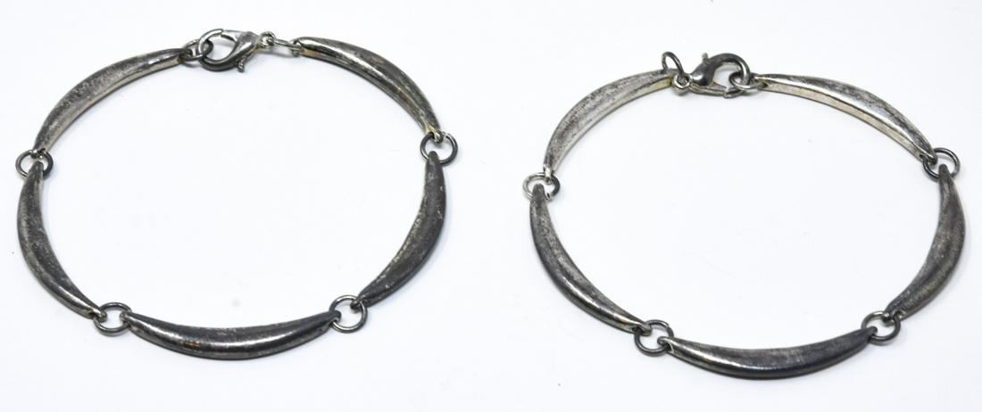 2 Silver Tone Crescent Moon Link Bracelets: 2 Silver Tone Crescent Moon Link Bracelets. Each measures 7 inches.