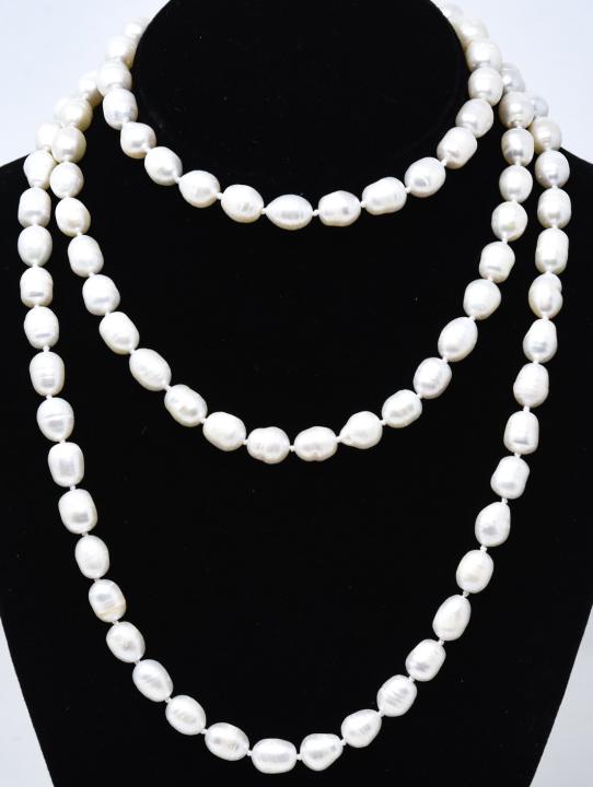 Hand Knotted 52 Inch 12 mm Baroque Pearl Necklace: Hand Knotted Oepra Length 52 Inch 10-12 mm Baroque Pearl Necklace. Hand knotted on white silk thread with high luster baroque pearls of 10-12 mm in length. Necklace measures approximately 52 inches ov