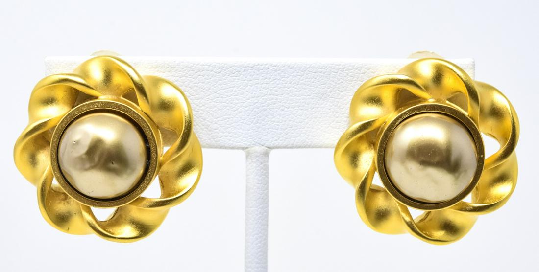 Karl Lagerfeld Gold Tone Faux Mabe Pearl Earrings: Karl Lagerfeld Gold Tone Faux Golden Mabe Pearl Clip Earrings. Signed on backs. Each measures 1 inch.