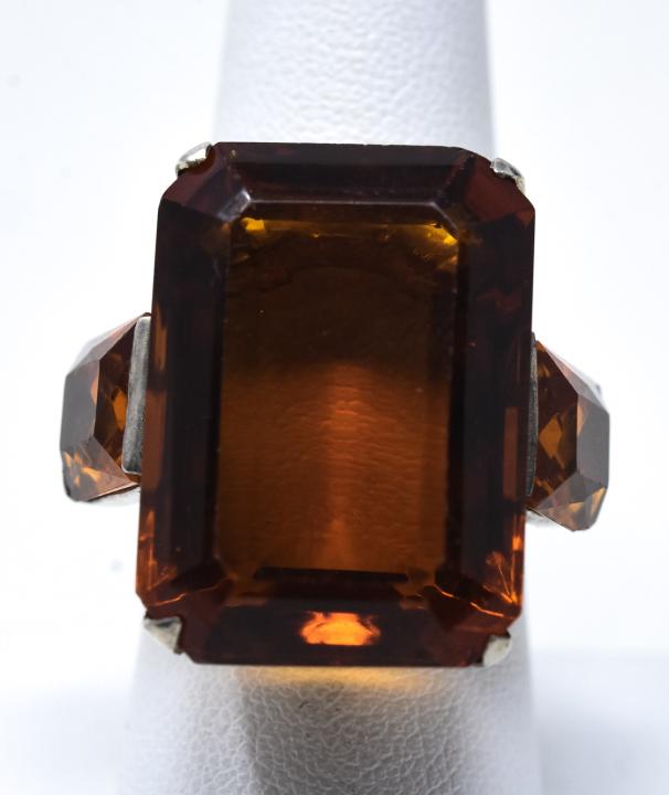 Circa 1945 Sterling Silver & Citrine Crystal Ring: Circa 1945 Sterling Silver & Citrine Crystal Ring. Retro sterling ring featuring an 18 mm x 24 mm citrine crystal with faceted side stones. Ring size 8.