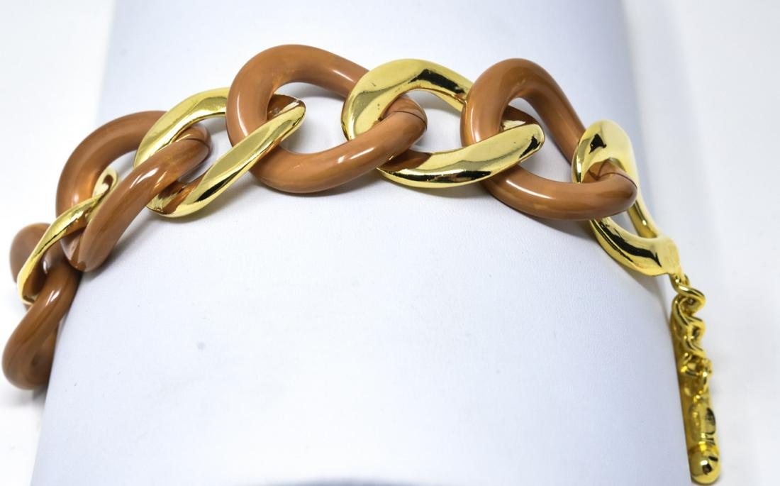 C 1980 Alexis Kirk Acrylic Gilt Curb Link Bracelet: C 1980 Alexis Kirk Acrylic Gilt Curb Link Bracelet. Large acrylic and gilt metal curb links with toggle clasp. 8.5 inches.