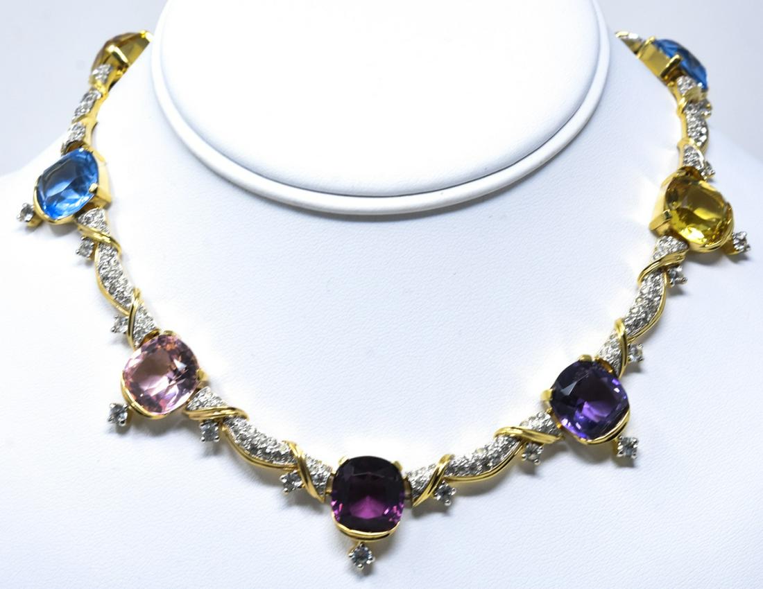 Jomaz Elegant Cushion Cut Sapphire Necklace: Jomaz Elegant Cushion Cut Sapphire Necklace. Featuring cushion cut sapphires in gilt and paste drop link settings with foldover clasp. 15 inches.