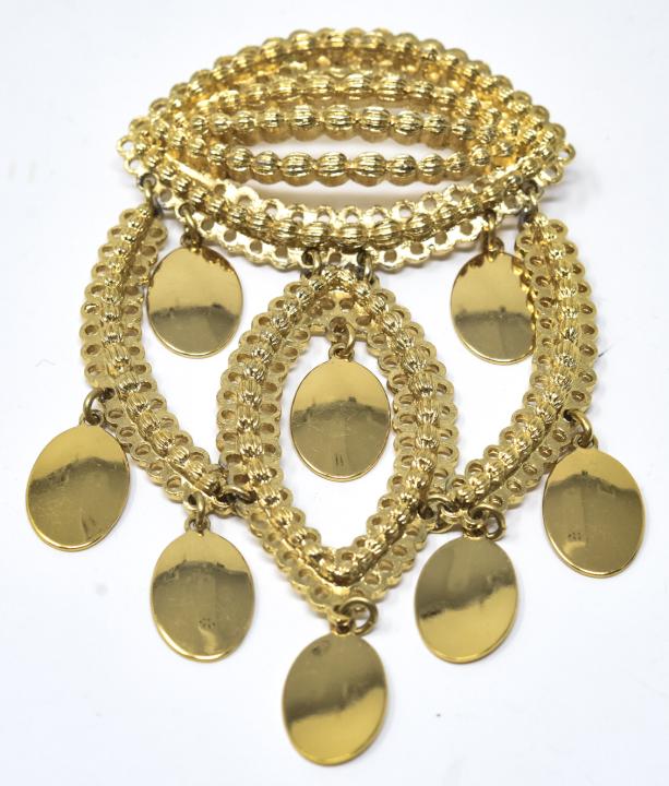 Monet C 1970s Gilt Articulated Dangle Brooch / Pin: Monet C 1970s Gilt Articulated Dangle Brooch / Pin. Multi section gilt articulated dangle brooch. Measures 3 7/8 inches.