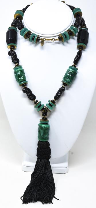 C 1965 Miriam Haskell Black Bakelite Necklace: C 1965 Miriam Haskell Black Bakelite Necklace. Miriam Haskell necklace with faceted black bakelite, molded black glass with hand blown jade like drum shaped beads with silk tassel pendant. Signed twic