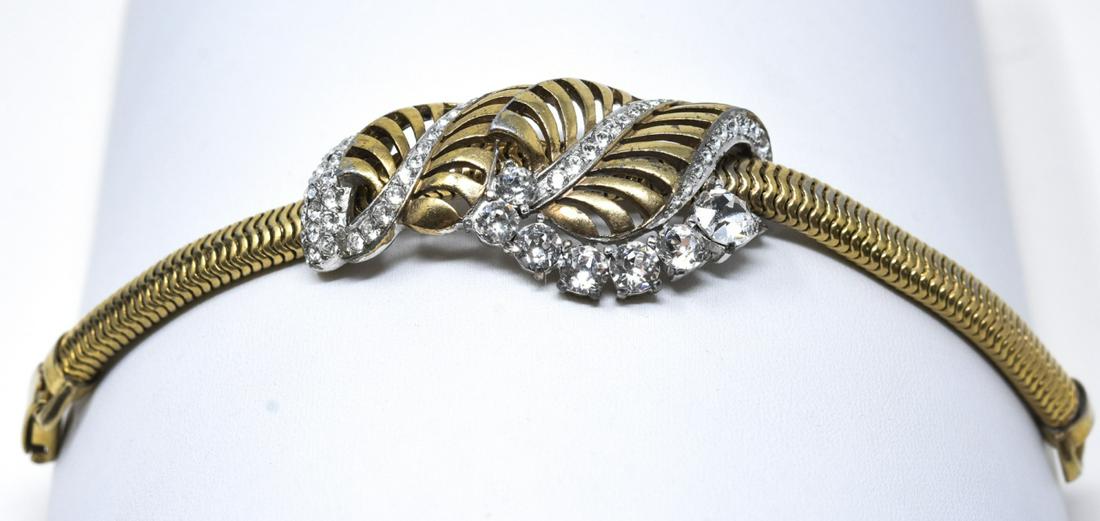 Retro Marcel Boucher Gilt Snake Chain Bracelet: Retro Marcel Boucher Gilt Snake Chain Bracelet. With openwork foliate center with baste borders. Design number 2967. With phrygian cap hallmark. Measures 6.5 inches.