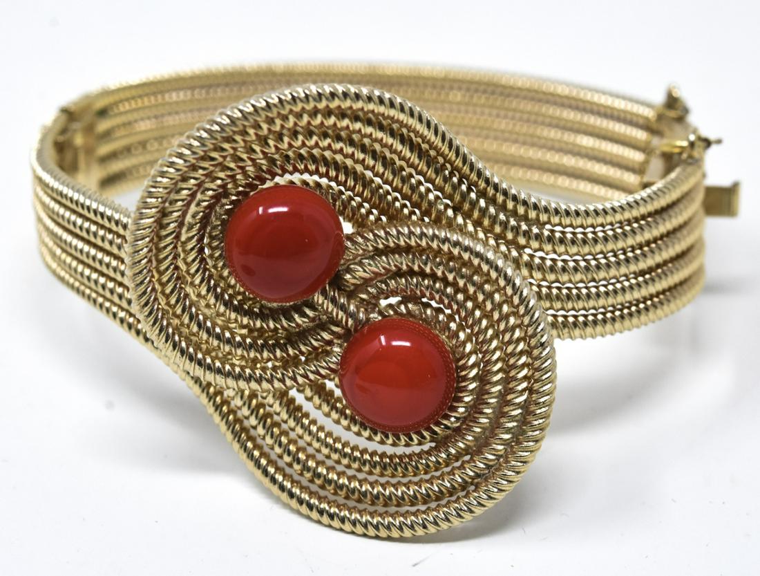 Vintage Bergere Bracelet w Faux Red Coral Accents: Vintage Bergere Bracelet w Faux Red Coral Accents. Signed. Rope motif. Safety chain. Measures 2.25 inches across interior opening. Bypass design.
