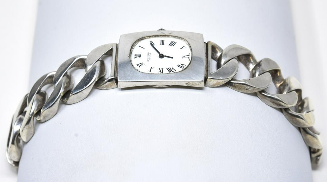 Jean Perret Geneve 800 Silver Heavy Watch: Jean Perret Geneve 800 Silver Heavy Watch. Vintave c 1990 800 silver heavy curb link chain watch with quartz movement. Measures 7.5 inches. Hallmarked.