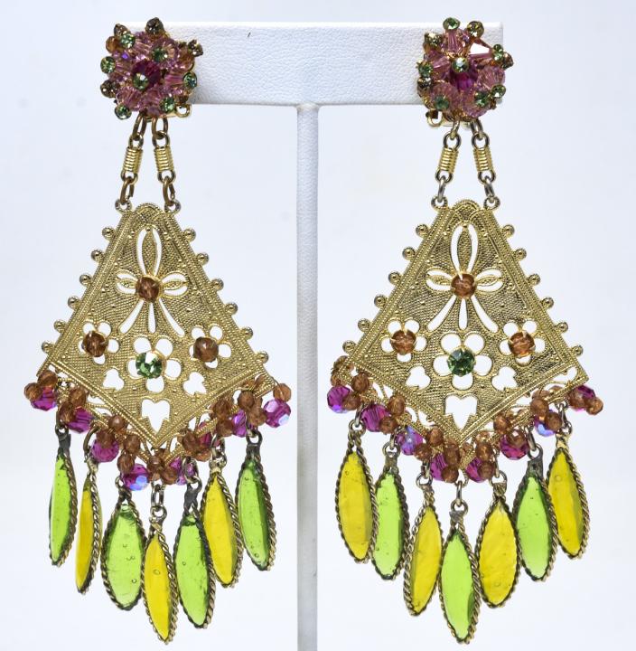 Pair Hattie Carnegie C 1960s Clip Earrings: Pair Hattie Carnegie C 1960s Clip Earrings. Each with beaded top with jeweled gilt drop and poured glass oval fringe. Each measures 4.25 inches.