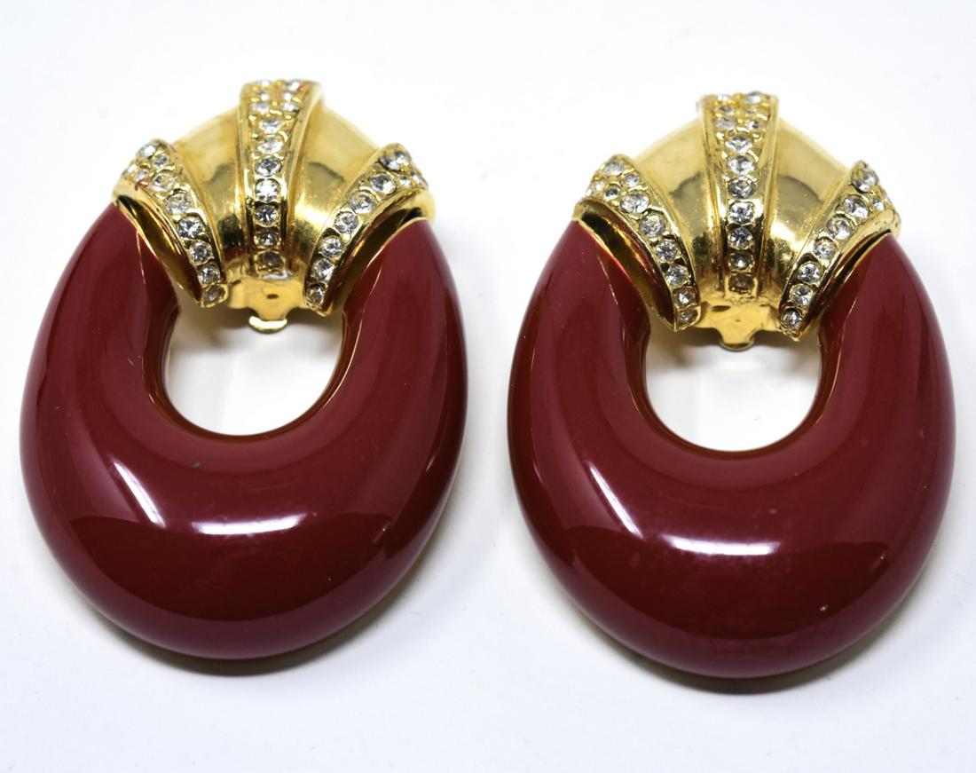 C 1990s Ciner Lacquer Clip Earrings: C 1990s Ciner Lacquer Clip Earrings. Pair of clip earrings by Ciner with gilt and paste tops with cinnabar tone lacquer movable drops. Each measures 2 inches.