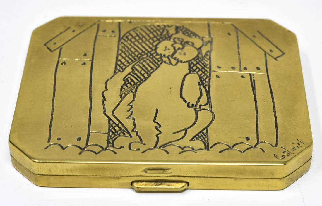 James Friell Gold Tone Engraved Ladies Compact: James Friell Gold Tone Engraved Ladies Compact. Gold tone ladies compact with engraved design of dog and dog house by cartoonist "Gabriel" James Friell. Measures 3 inches x 3.5 inches.