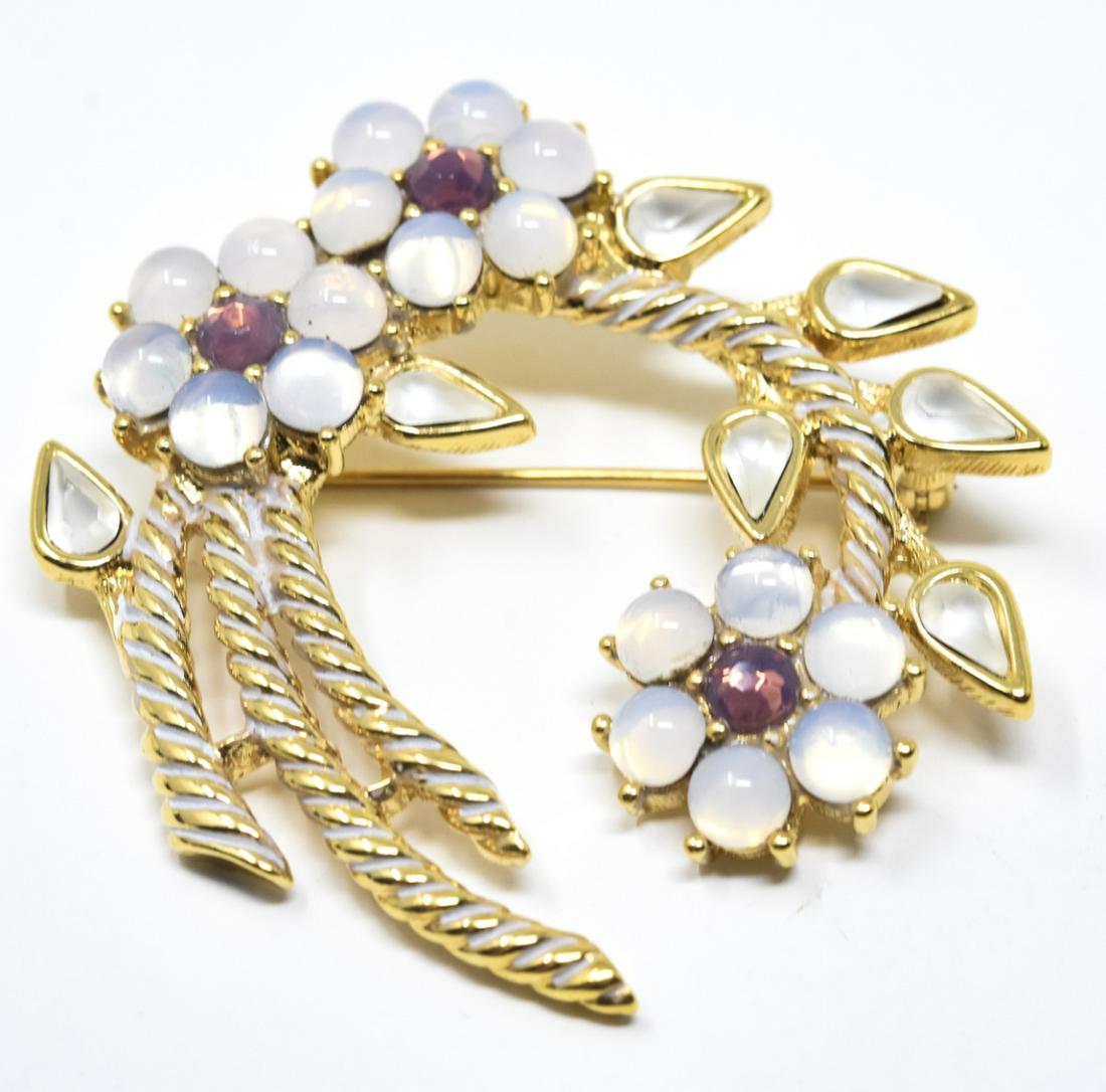 C 1995 Monet Moonstone Cabochon Brooch / Pin: C 1995 Monet Moonstone Cabochon Brooch / Pin. Bouquet arch of moonstone cabochon flowers with purple centers. Measures 2 inches.