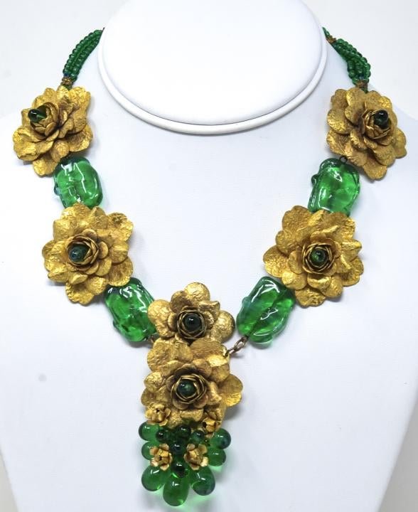 Rare Unsigned Miriam Haskell Gilt Flower Necklace: Rare Unsigned Miriam Haskell Gilt Flower Necklace. Rare unsigned Miriam Haskell gilt tiered flower and emerald blown green glass cluster, station and three strands. Measures 16.75 inches.